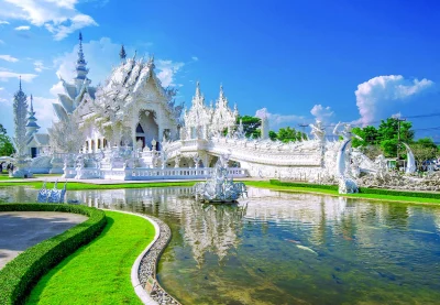 Romantic couple on a beach enjoying a honeymoon sunset in Thailand